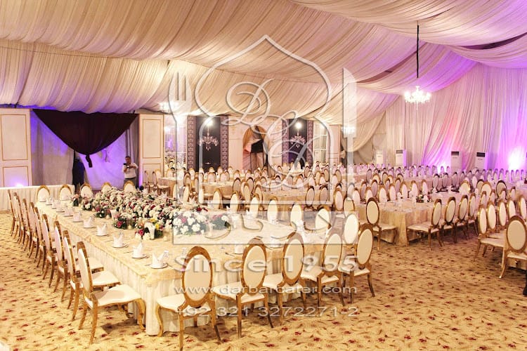 Elegant wedding ceremony setup in Darbar Catering, featuring lavish decor and floral centerpieces.