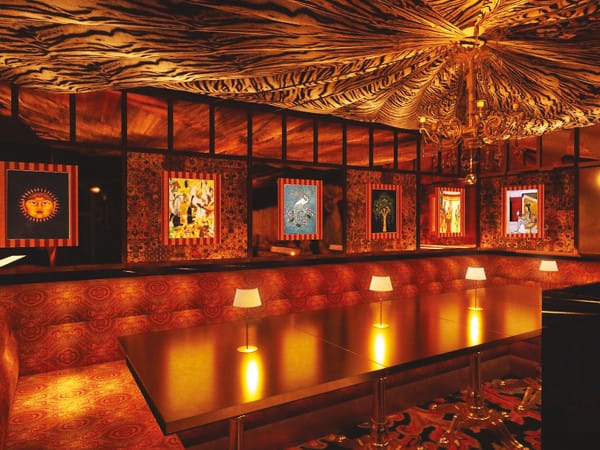 Elegant Ambassadors Clubhouse venue with luxurious seating for upscale events and networking.
