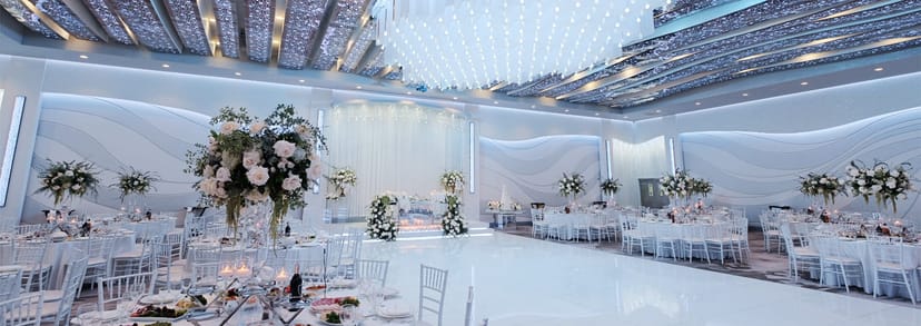 Elegant banquet hall with shimmering ceiling lights for weddings and upscale events.