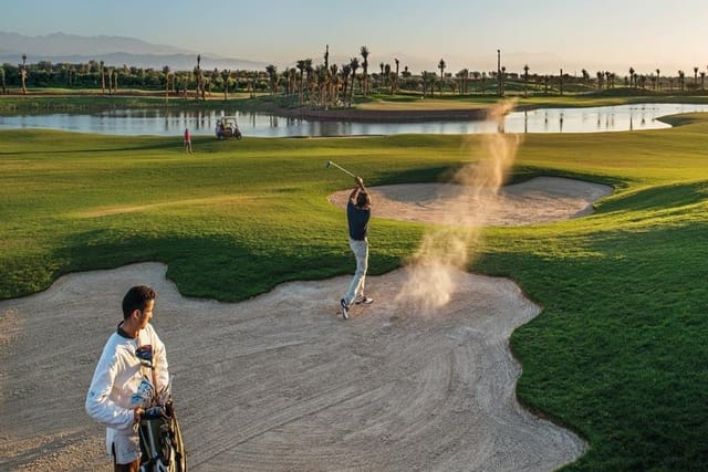 Golfer mid-swing at Royal Palm Golf & Country Club, ideal for corporate retreats and events