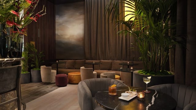 Sophisticated Pan Pacific London bar with plush seating, perfect for networking events.