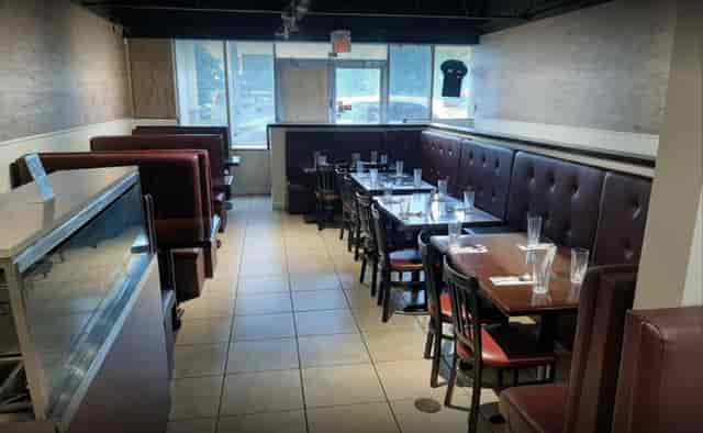 Intimate dining space at ZaiQa Restaurant, perfect for casual gatherings and private dinners.