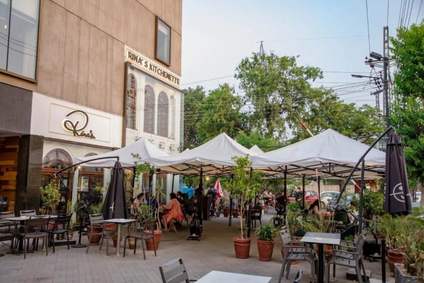 Outdoor event space at Rinas Kitchnette with canopies, ideal for casual gatherings.