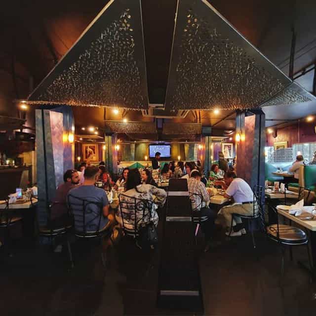Vibrant restaurant setting at Café Zouk, ideal for corporate events and private parties.