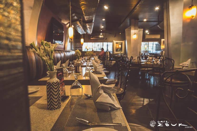 Elegant dining setup at Café Zouk, Lahore for intimate events and business meetings.