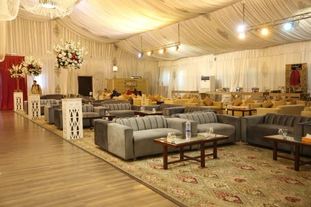 Gourmet Victoria Marquee with lounge seating for elegant meetings and social events.
