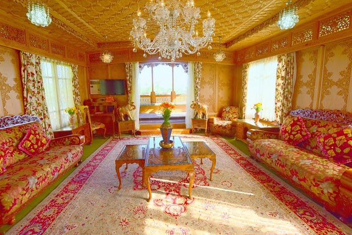 Elegant houseboat meeting space with ornate decor, ideal for corporate retreats and gatherings.