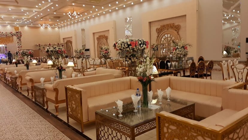 Elegant Mannsiraj Hall with plush seating, perfect for weddings and formal gatherings.