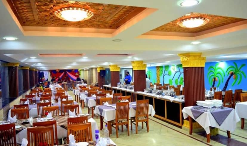 Spacious banquet room at Hotel The Residency, perfect for events and conferences.