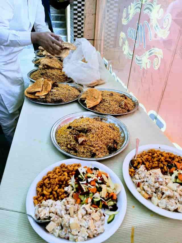 Banquet hall food spread with traditional dishes for events and catering success.