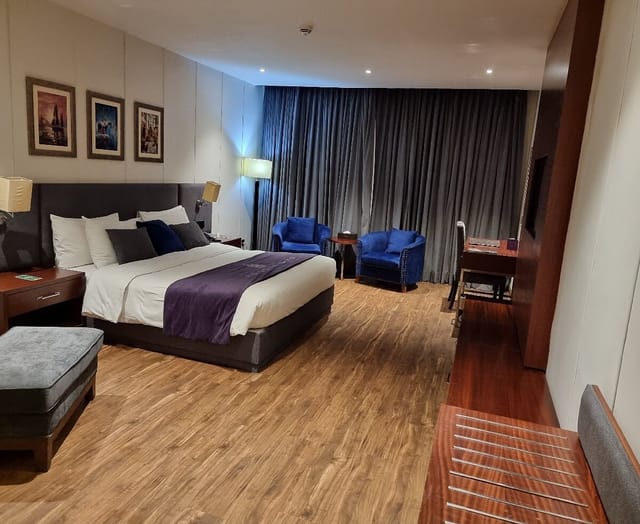 Indigo Hotel meeting room with spacious layout, ideal for business events and networking.