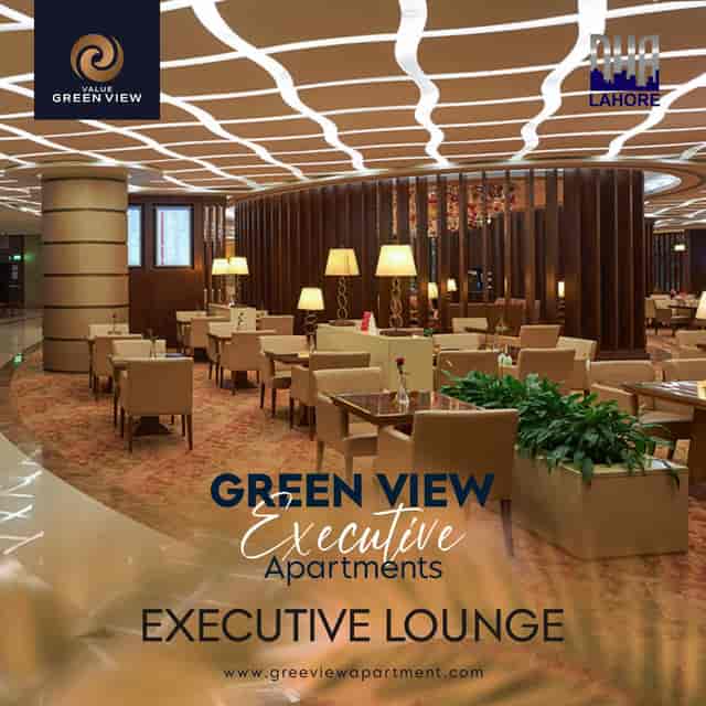 Stylish Green Lounge lobby with warm lighting for meetings and networking events.