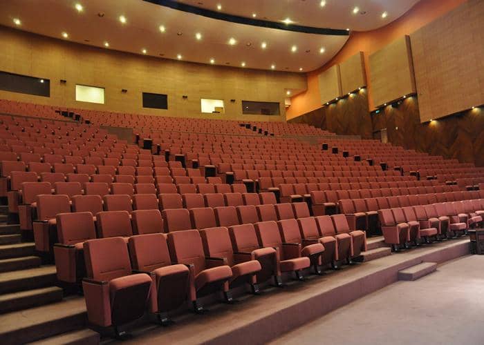 General Hall A at Expo Centre Lahore with plush pink seating for conferences or performances.