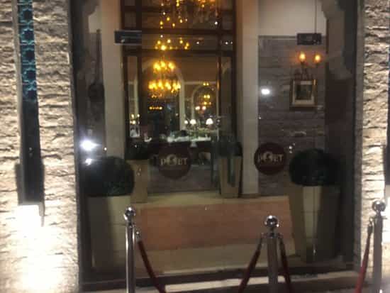 Elegant indoor dining area at Poet Boutique for formal events like conferences and gala dinners.
