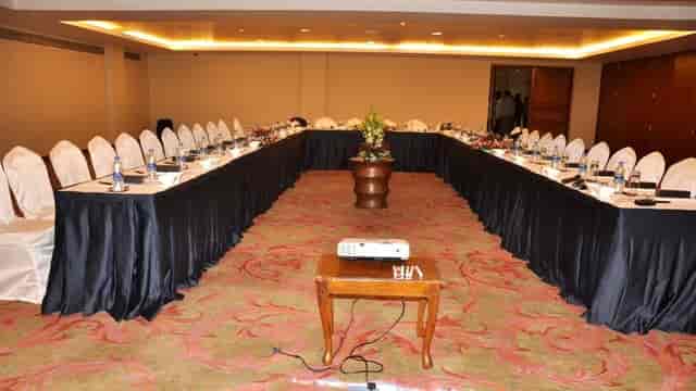 Conference room at Taj Dal View with U-shaped tables, ideal for professional events.