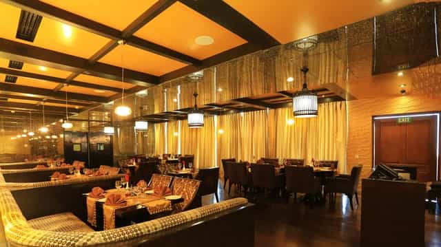 Sophisticated dining area at Taj Dal View, Srinagar for elegant gatherings and events.