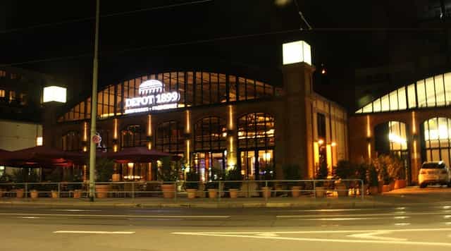 Illuminated beer garden at Depot 1899, ideal for evening corporate and social events.