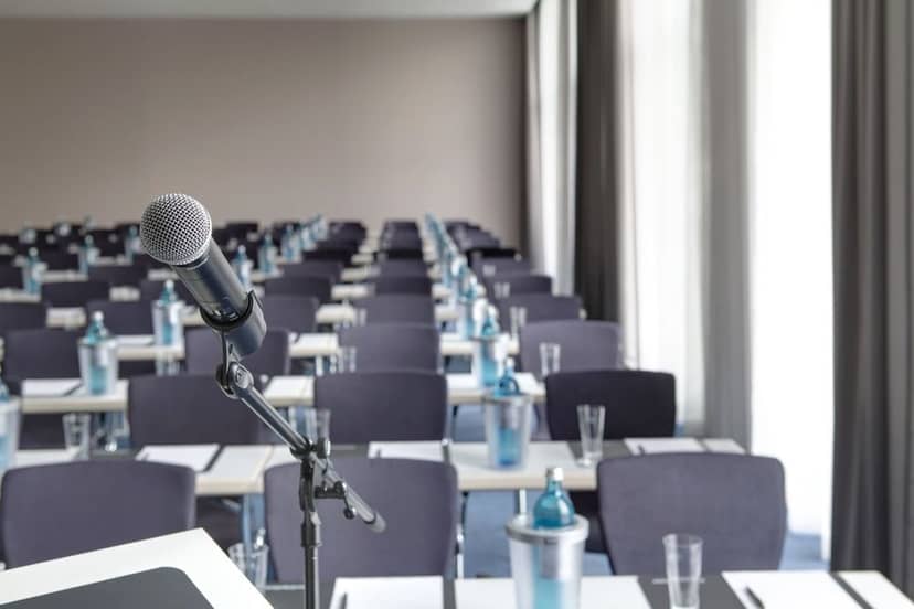 Meeting room setup with microphone for professional gatherings and presentations.