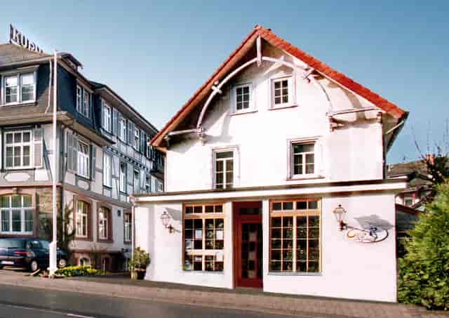 Charming Cafe in Hotel Kurhaus Ochs, ideal for corporate events and team-building retreats.