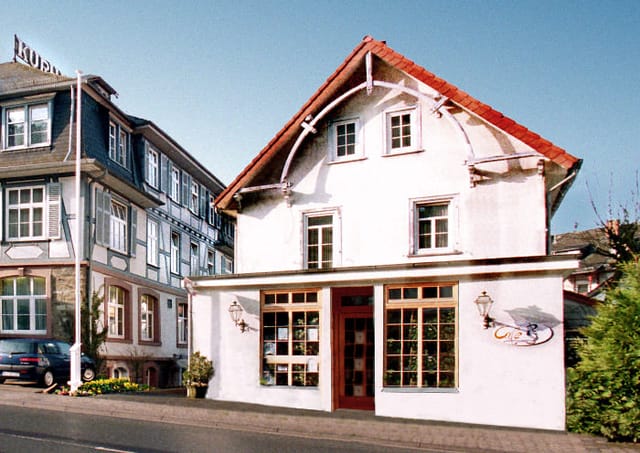 Charming Cafe in Hotel Kurhaus Ochs, ideal for corporate events and team-building retreats.