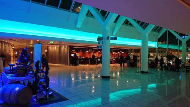 Congress Hotel at Sheraton Frankfurt Airport, modern venue with vibrant blue lighting for events.