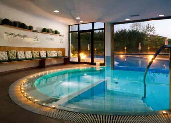 Serene spa area with hot tub at Villa Pace Park Hotel for corporate retreats.