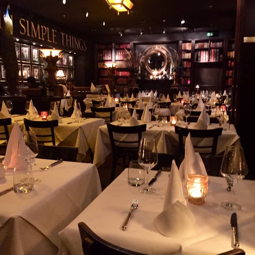 Sophisticated dining at Ivory Club with elegant tables for corporate events and intimate gatherings.
