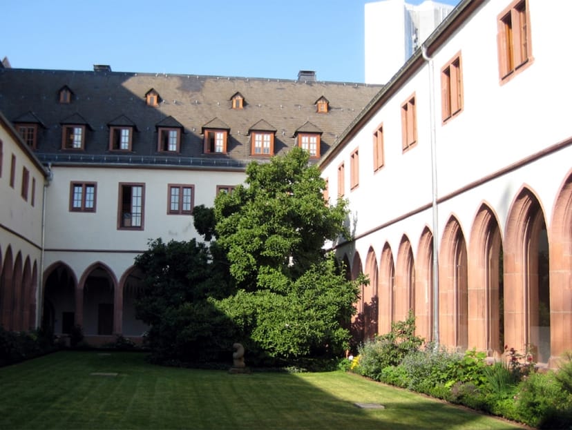 Serene courtyard in Carmelite Monastery, ideal for gatherings and meetings.