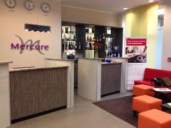 Polished reception area at Le Méridien Frankfurt, ideal for meetings and events.