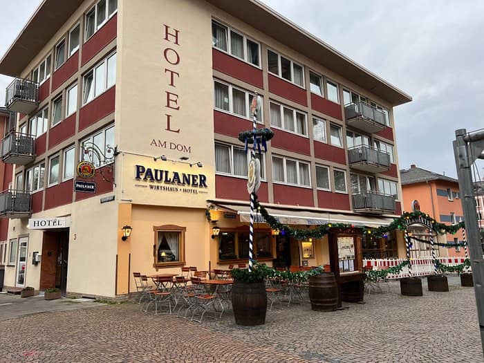 Paulaner Hotel rooms with outdoor seating, perfect for events and meetings.