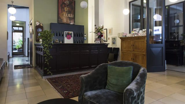 Stylish hotel bar with elegant decor, perfect for events and meetings.