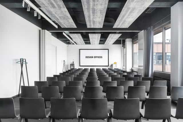 Modern conference room in Villa Westend Hotel, ideal for corporate meetings and workshops.
