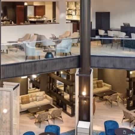 Modern multi-level event space at Main Tapas Lounge, ideal for conferences and social gatherings.
