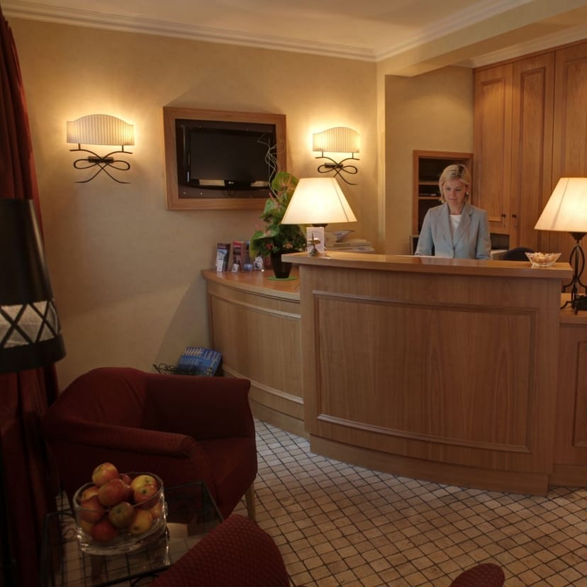 Conference Room at Hotel Villa Florentina with warm lighting for meetings and events.