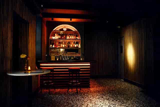 Stylish Main Bar in Velvet Brooklyn, warm lighting for networking and intimate gatherings.
