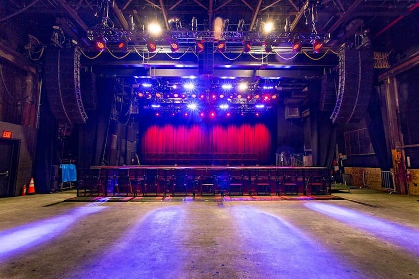 Main Concert Hall in Brooklyn Steel with vibrant stage lights for events and concerts.