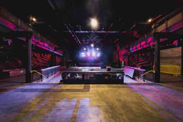 Brooklyn Steel's Main Concert Hall: modern venue with stage, lighting for concerts and events.
