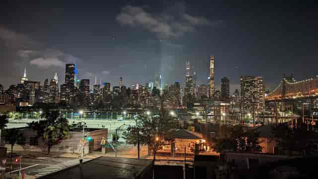 Nighttime city skyline view from The Bordone LIC's outdoor terrace, perfect for events.