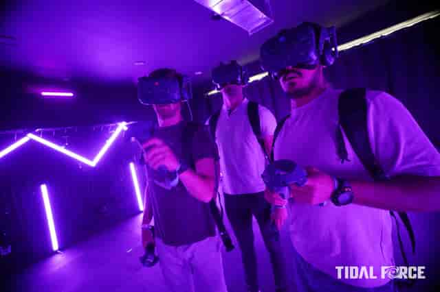 Children's amusement center Tidal Force VR with neon lighting for team-building events.
