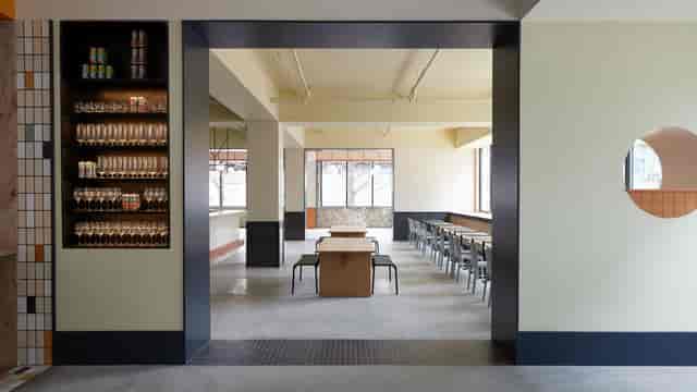 Modern event space at TALEA Beer Co. with versatile seating for meetings and gatherings.