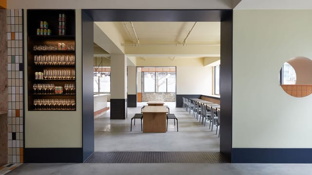 Modern event space at TALEA Beer Co. with versatile seating for meetings and gatherings.