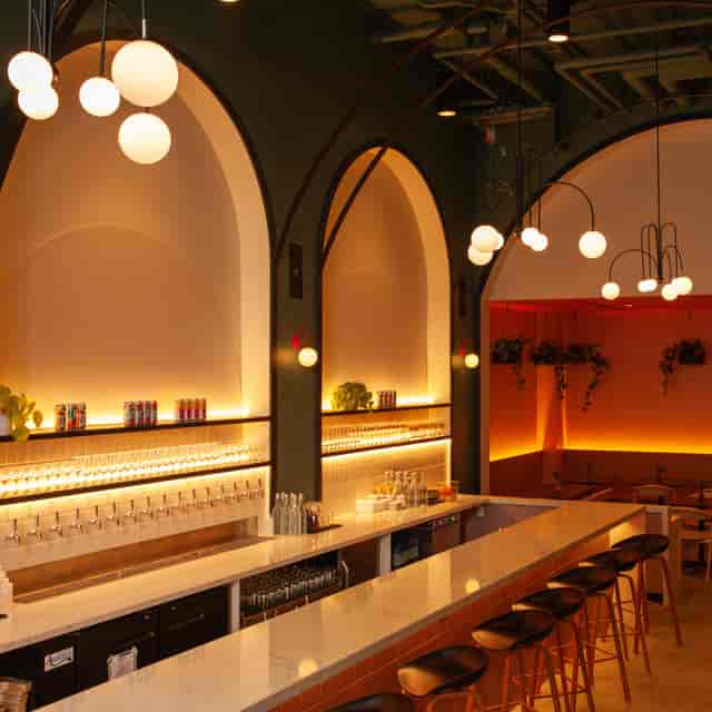 Stylish bar at TALEA Beer Co. for cocktail receptions and networking events.