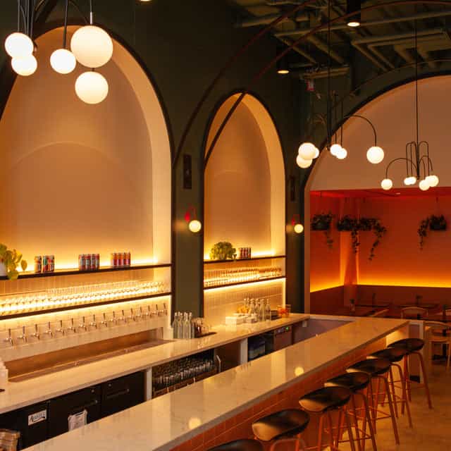 Stylish bar at TALEA Beer Co. for cocktail receptions and networking events.