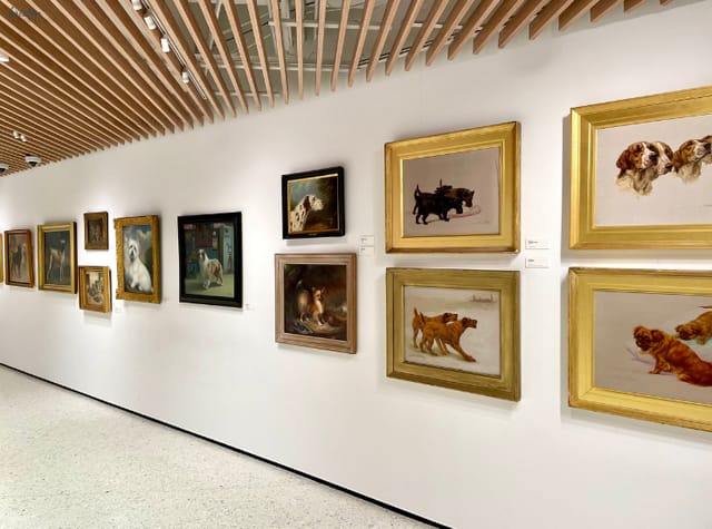 Galleries at AKC Museum of the Dog with vibrant dog portraits for event networking.