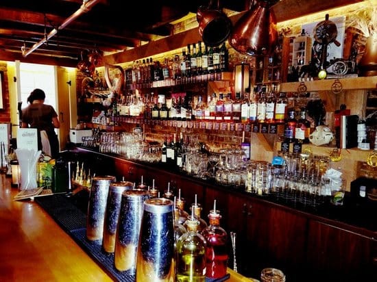 Well-stocked bar at The Dead Rabbit, perfect for events and cocktail receptions.