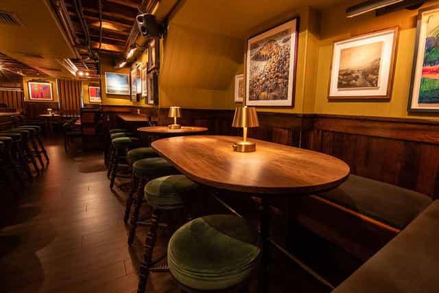 "Cozy Second Floor Buyout at The Dead Rabbit, ideal for private meetings and events."