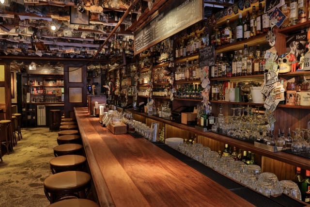 Rustic bar in The Dead Rabbit, perfect for cocktail receptions and gatherings.
