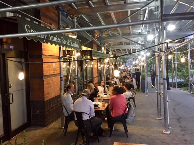 Cozy outdoor dining at Granny Annie's Bar & Kitchen, perfect for networking events.