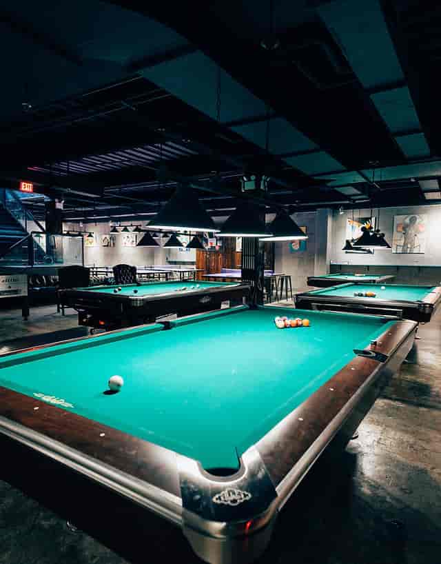 Vibrant billiards bar in Sour Mouse NYC, ideal for team-building and social mixers.