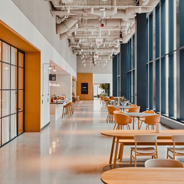 "Modern event space with natural light for networking and meetings at Convene WorkPlace."